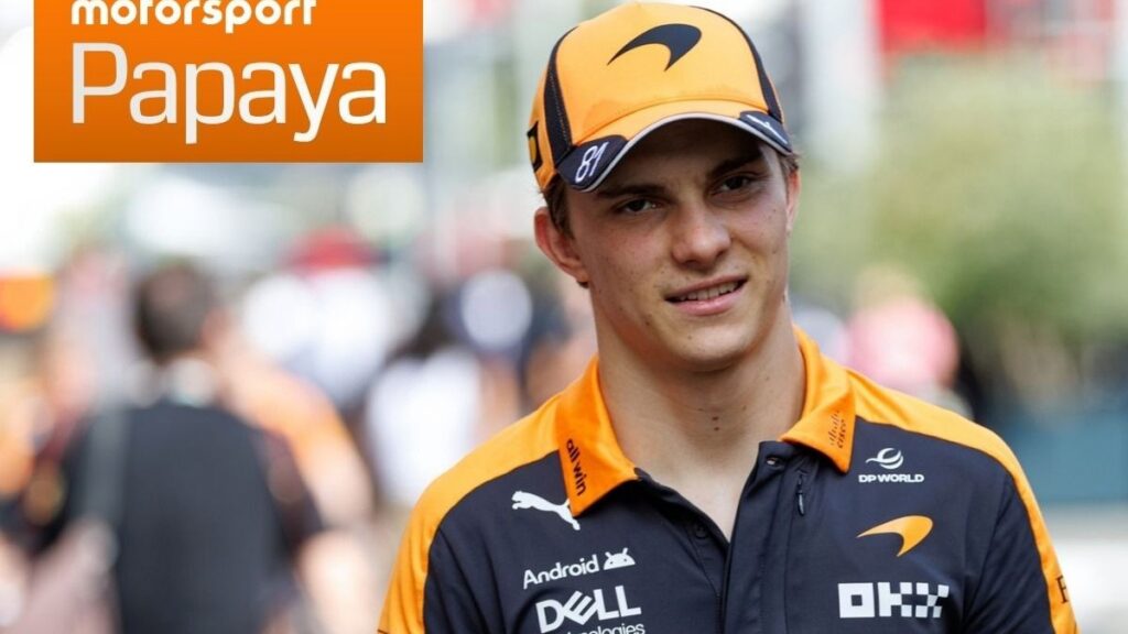 Оскар Піастрі спілкується з юним фанатом у боксах McLaren